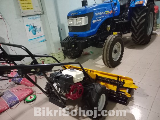 ধানকাটা রিপার মেশিন